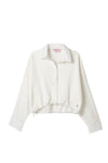 Blusa silueta amplia marfil para niña