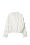 Blusa silueta amplia marfil para niña